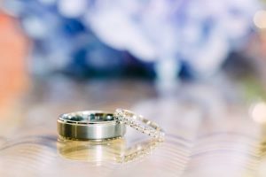 Wedding rings on glass table