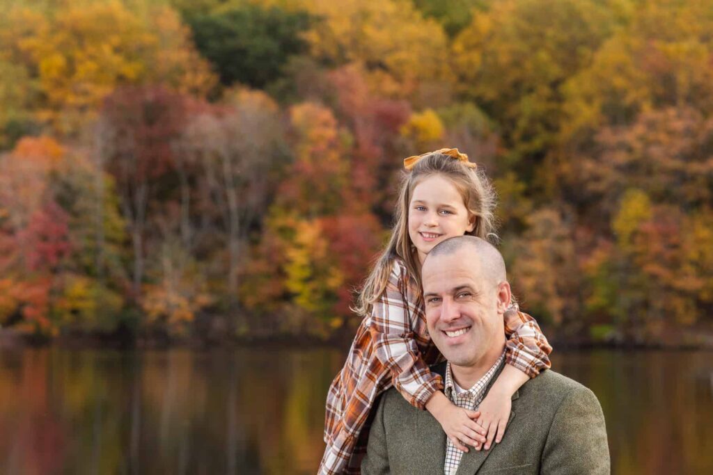 Father and daughter with fall colors